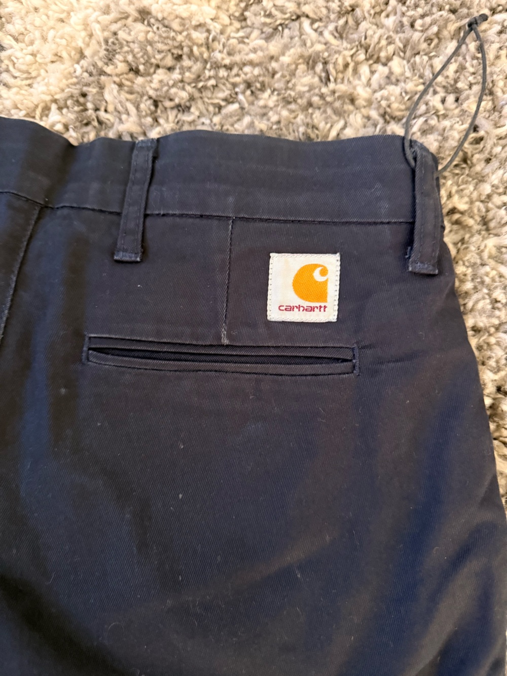 Carhartt Dark Blue Work Pants with Orange Logo Patch
